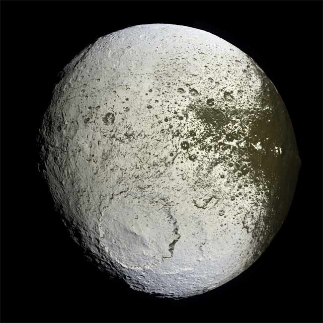 Mystery of Saturn's Two-Faced Moon Solved